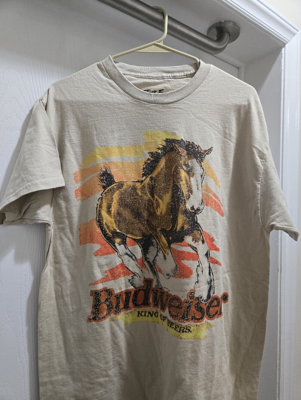 Junk Food Clothing Cream Tee with Brown Horse & Orange-Yellow Stripes